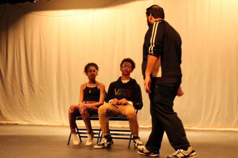 GHS theatre director Timothy Haynes works with middle school theatre students during a rehearsal for their production of Annie Jr. 