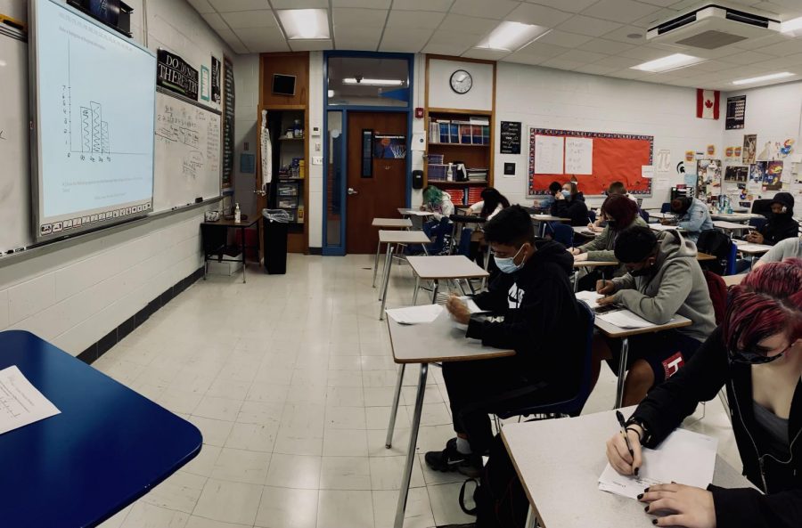 Students in Mr. Clarksons class solve Algebra equations. Photo by Julie Alsbury.