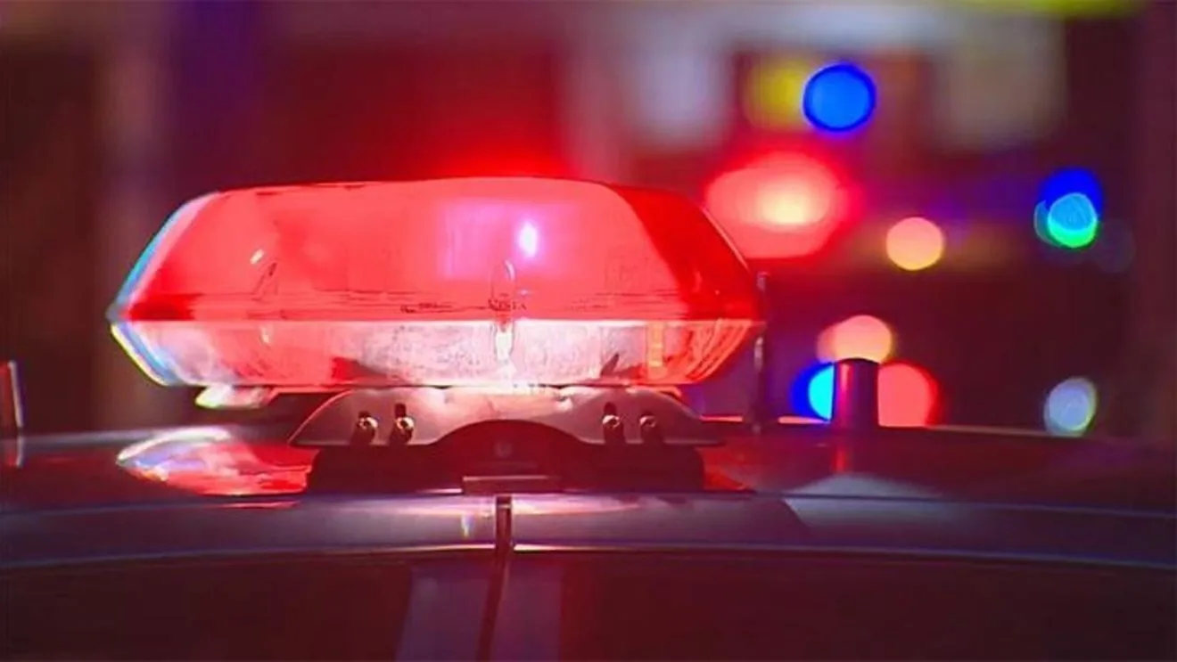 Police investigate a shooting scene near the Manassas train depot during First Friday