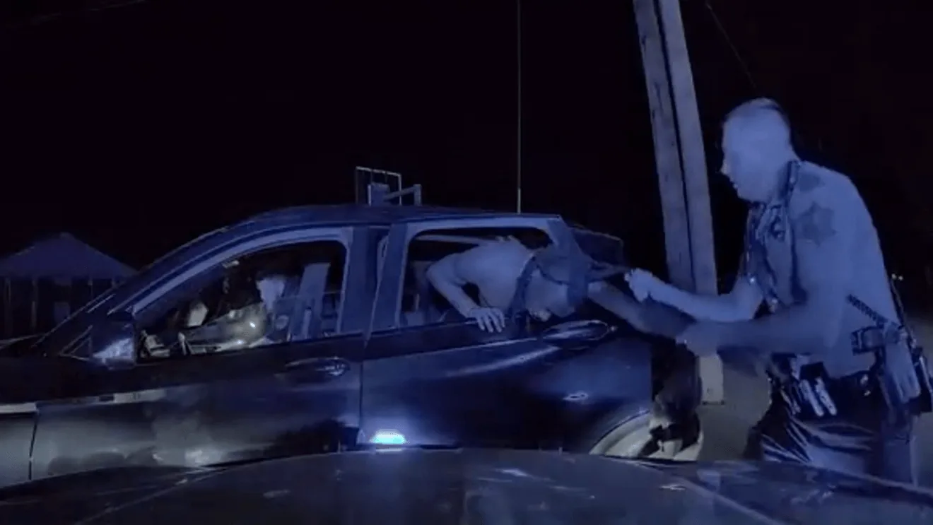 Dashcam footage from a police stop involving a vehicle and Arkansas State Police trooper