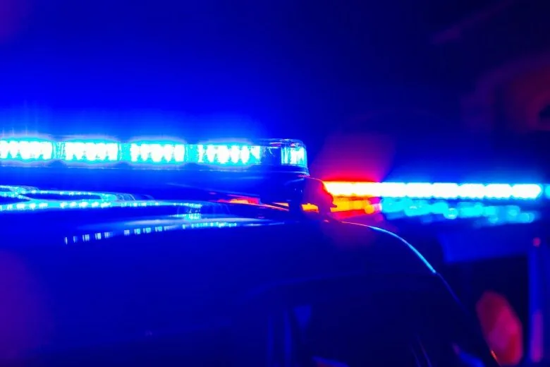 Police investigate a shooting scene near the Manassas Train Depot in Old Town Manassas
