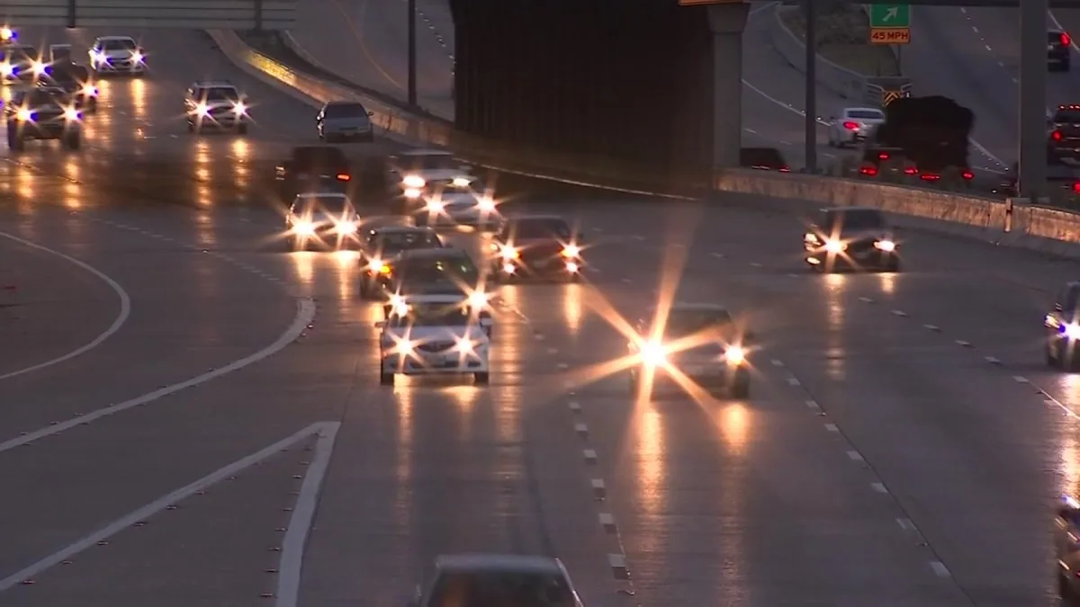 Dallas Police vehicle on a freeway shoulder during traffic enforcement