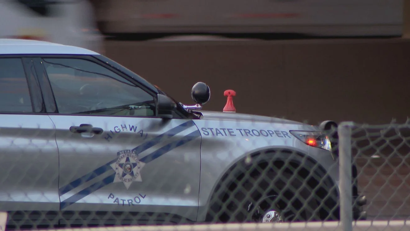 Police investigate a fatal pedestrian crash on a closed stretch of State Route 147 in Clark County